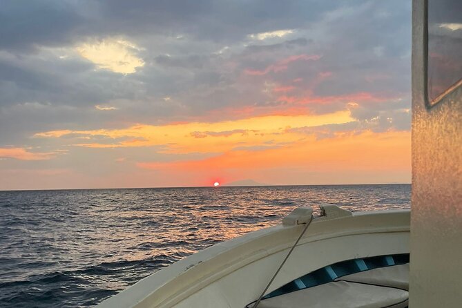 2-Hour Sorrento Coast Sunset Cruise with Dinner Experience - Dinner on board, with Sorrento flavors