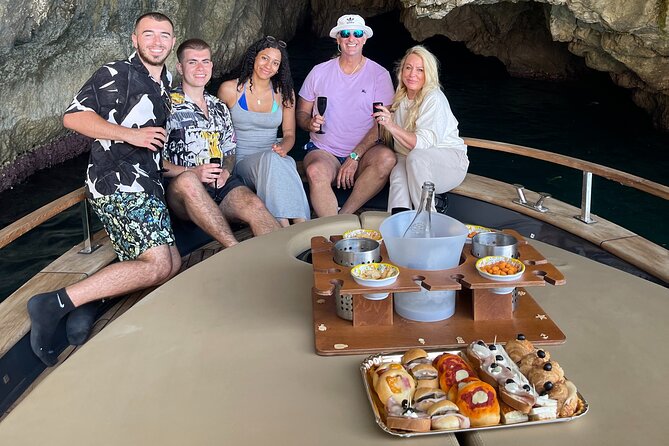 All-Inclusive Capri Boat Tour with City Visit from Positano - Capri’s coast, from Spiaggia Grande to Bagni di Tiberio