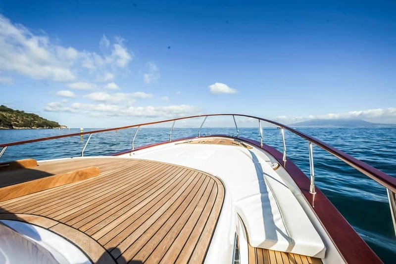 Amalfi Coast: Boat and Snorkeling Tour with Fruit & Drinks - Captains, music, and the feel on board