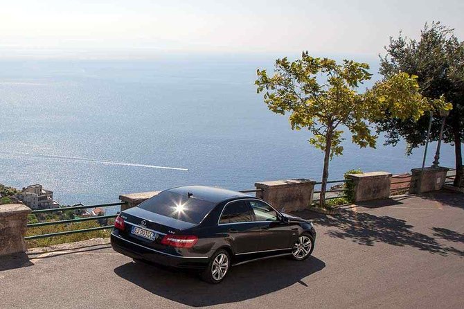 Amalfi coast day tour from Sorrento with an English speaking private driver - Positano from church to beach