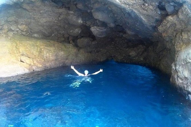 Amalfi Coast Kayak Tours from Marina del Cantone - Entering the coastal caves