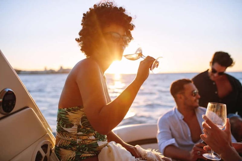 Amalfi Coast Shared Sunset Cruise: Swim, Drinks & Views - A traditional gozzo, not a big tour boat