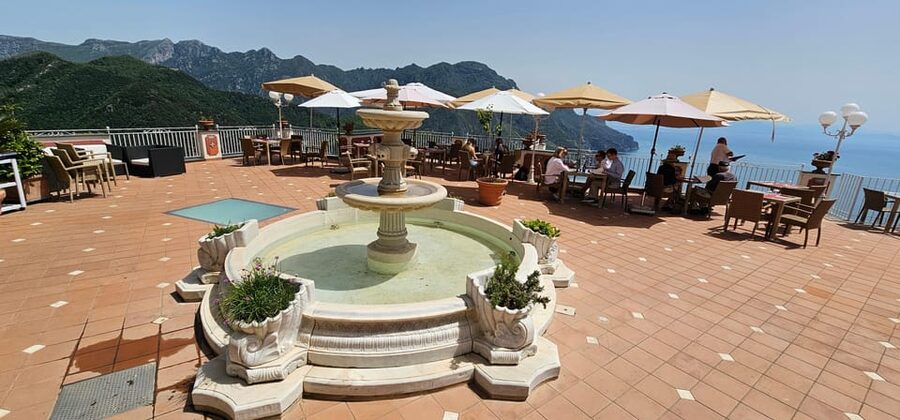 Amazing Amalfi Coast Drive from Sorrento - Positano: steep streets, shops, and coastal views