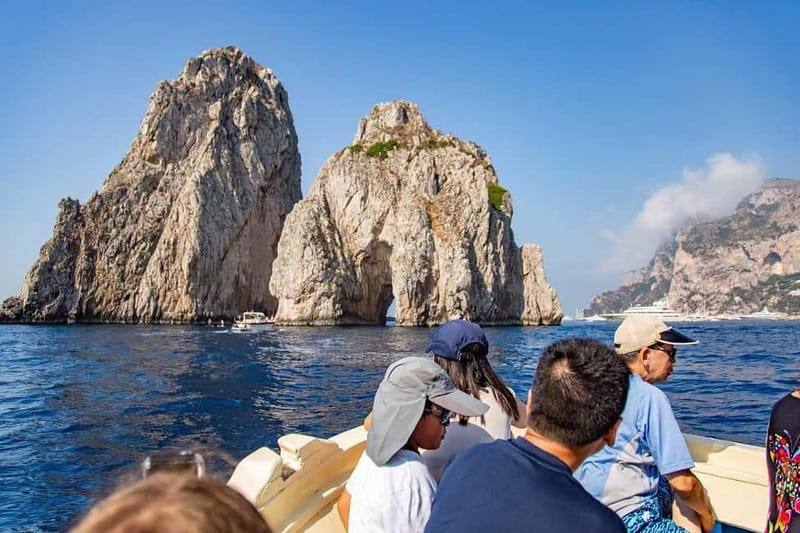 Boat Tour to Capri with Lunch on Board, Swimming and Fun - The coast before Capri
