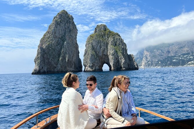 Capri, Blue Grotto by Priority, Faraglioni Swim and City Visit - What this Capri boat trip does best