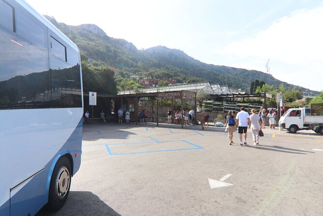 Capri & Blue Grotto: Full-Day Tour with Guided Island Exploration - Seeing the Faraglioni from the water