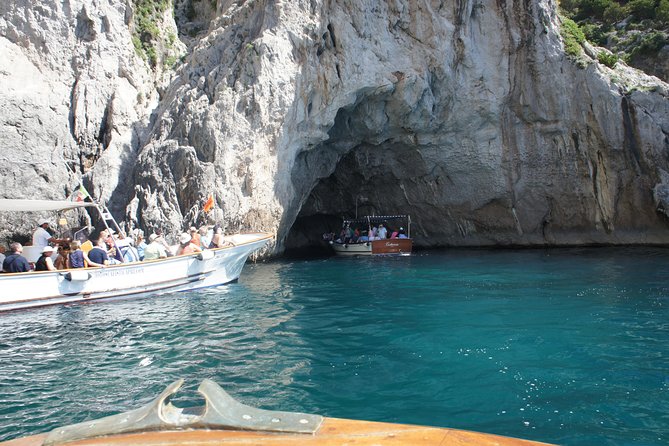 Capri & Blue Grotto Small Group Full-Day Boat Tour from Positano - Faraglioni rocks from the water
