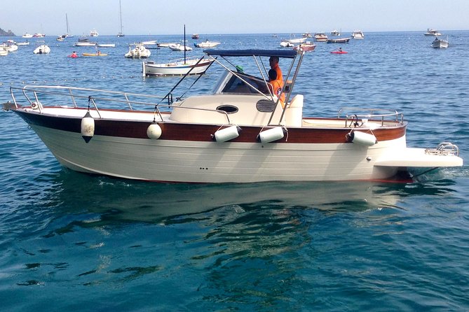 Capri & Blue Grotto Small Group Full-Day Boat Tour from Positano - Finding the orange Cassiopea booth at 8:00 am