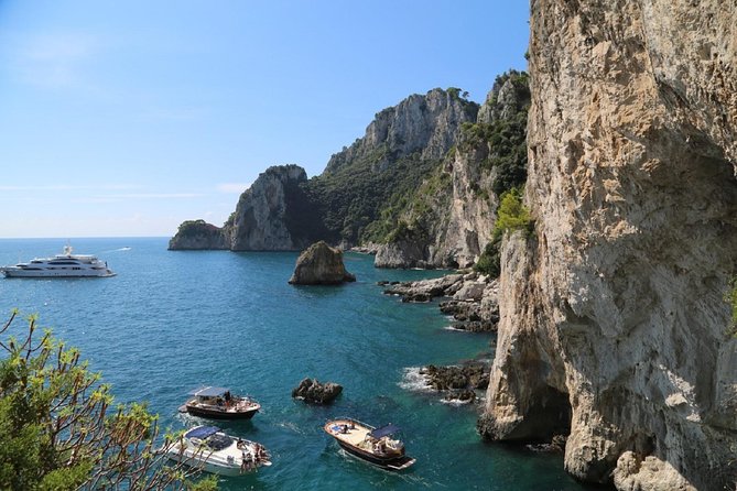 Capri Boat tour from Positano with Light Lunch, Drinks & Swim - Circling Capri by boat
