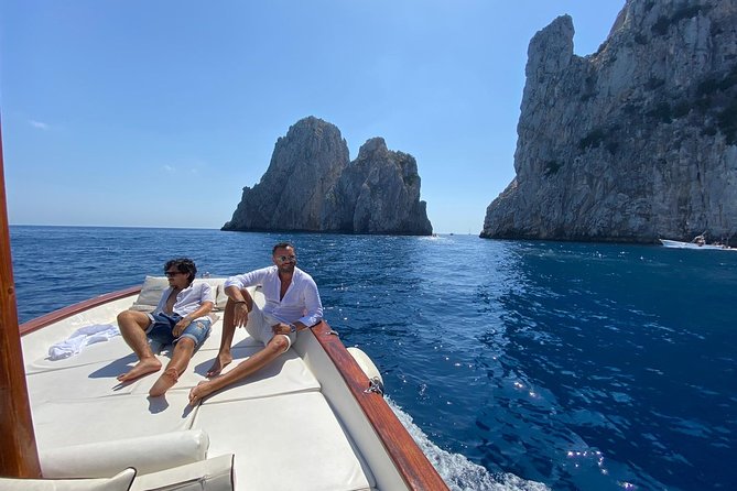 Capri Boat Tour: Grottoes, Swim & Sip Limoncello in a Small Group - Swimming, snacks, drinks, and limoncello