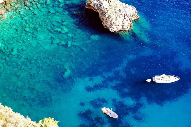 Capri by Sea Private Boat Excursion - Passing through the Faraglioni