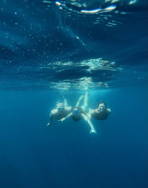 Capri: exclusive boat tour - Salto di Tiberio and the White Grotto