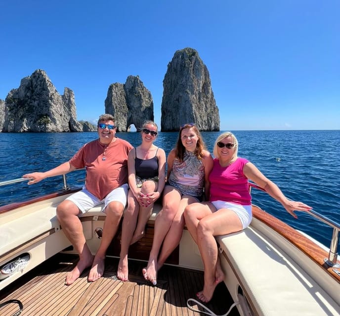 Capri: Exclusive Boat Tour of Hidden Gems with Swimming - Faraglioni Views and Photo Time