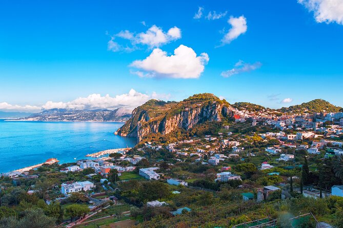 Capri Guided Boat Experience with Island Exploration and Transfer - Four free hours at Spiaggia di Marina Piccola