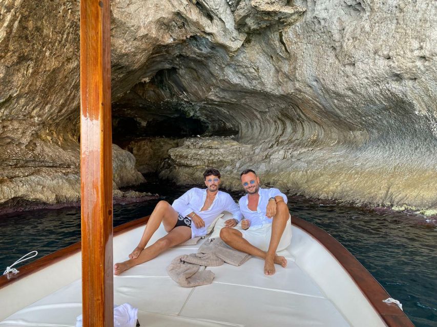 Capri: Island and Grottos Boat Cruise with Snacks and Drinks - Punta Carena and the famous Faraglioni