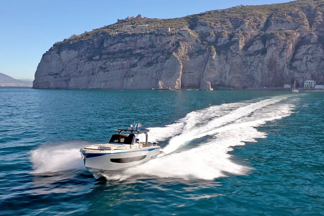 Capri Private all inclusive Boat Tour with City Exploration - Punta Carena Lighthouse and the western caves