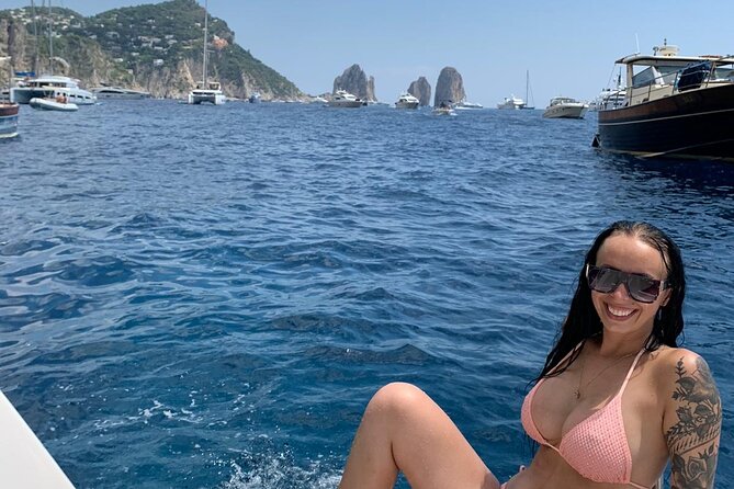 Capri Private all inclusive Boat Tour with City Exploration - Mermaid’s Rock and the sailors’ cave