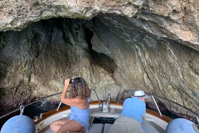 Capri Private Boat Experience - Caves, coves, and the changing color of the sea