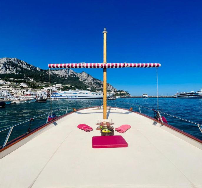 Capri: Private Island Boat Tour with Snorkeling and Swimming - The Faraglioni Rocks from sea level