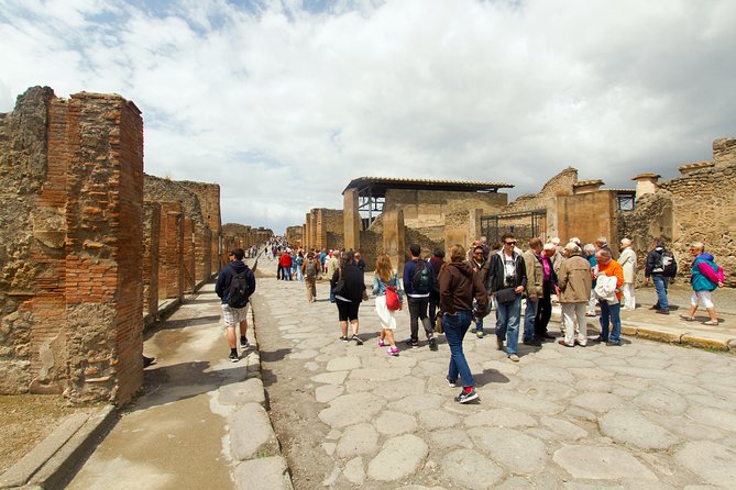 Complete Pompeii Skip the Line Tour with Archaeologist Guide - Roman baths, cemetery, and the brothel