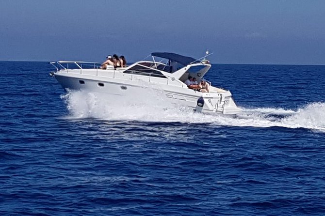 Excursion to Capri by shared boat departure from Sorrento - Seeing Villa Jovis from the water