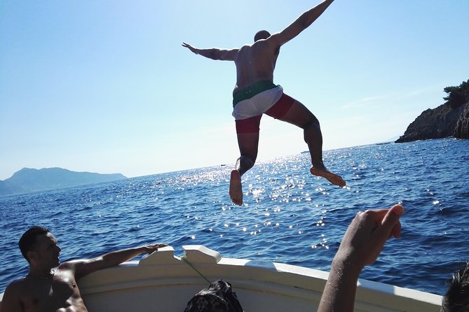 Fishing and Tourism in Capri - Swimming in the water around Capri
