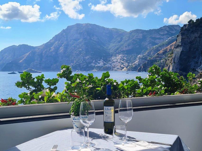 From Amalfi: 7H Amalfi Coast - Group Tour by boat - Lunch at La Gavitella in Praiano