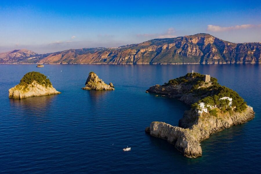 From Amalfi: Group Boat Tour to Capri with Swimming - Cookies, limoncello, and Li Galli on the return