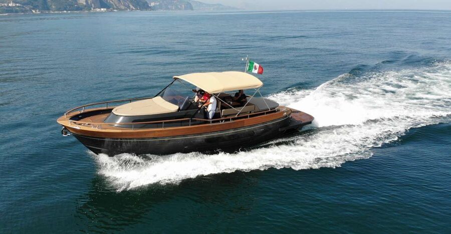 From Naples: Boat Tour to Capri Island with Aperitiv - Capri’s cliffs, caves, and Faraglioni