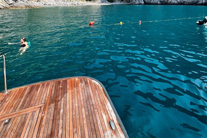 From Positano : Elite Capri Boat Day Free Bar, Brunch & City Walk - The Faraglioni, White Grotto, and the cliff near Villa Jovis