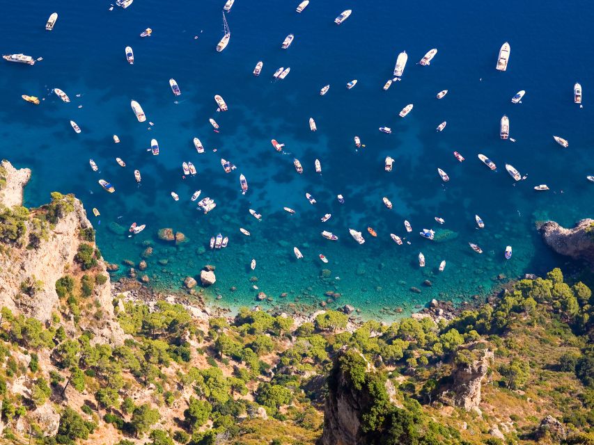 From Sorrento: Capri and Blue Grotto Boat Tour - Sailing past the Natural Arch and Faraglioni Rocks