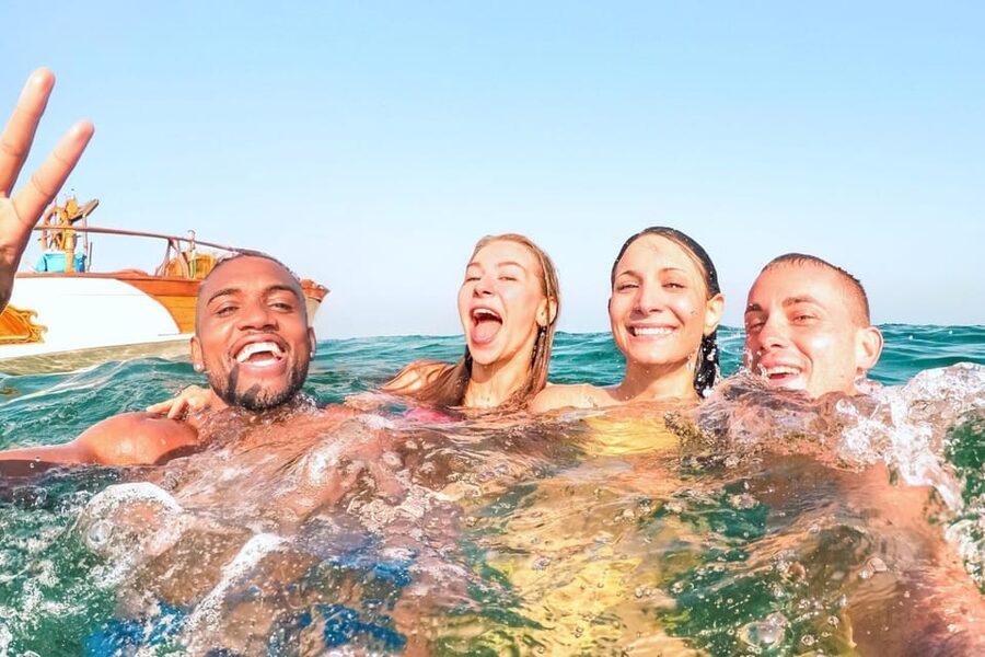From Sorrento: Capri Boat Tour with Snorkeling & Drinks - Leaving Sorrento and following the coast