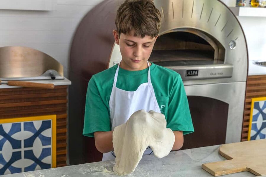 From Sorrento: Pizza-Making Class w/ View of Mount Vesuvius - Stretching, topping, and eating your pizza