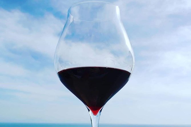 Genuine Home Cooking Class + Wine Tasting - A family kitchen near La Praia