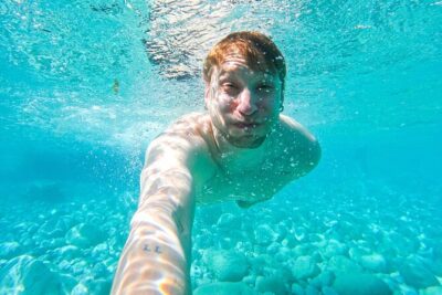 Kayak tour in Capri between caves and beaches. Photos included.