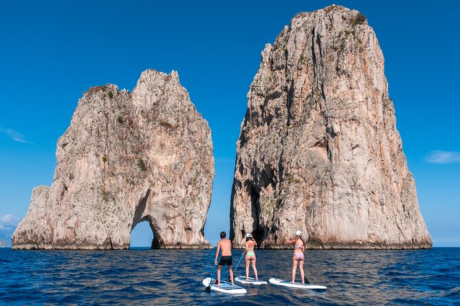 Paddleboard in Capri between caves and beaches. Photos included! - Swimming in Capri’s clear water