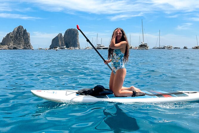Paddleboard in Capri between caves and beaches. Photos included! - Guides, pacing, and group size