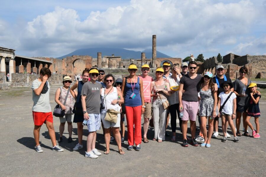 Pompeii Skip-the-Line Tour with Expert Archeological Guide - Walking into a city stopped by Vesuvius