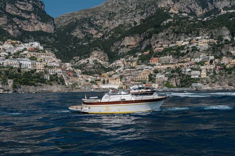 Positano: Amalfi Coast & Emerald Grotto Private Boat Tour - Snorkeling at Scoglio dellIsca