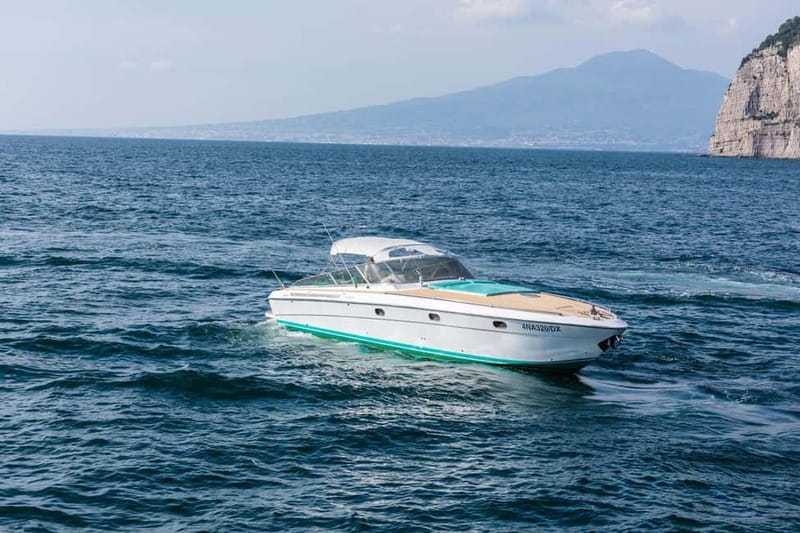 Positano: Amalfi Coast & Emerald Grotto Private Boat Tour - Drinks, sunset, and the ride back to Positano