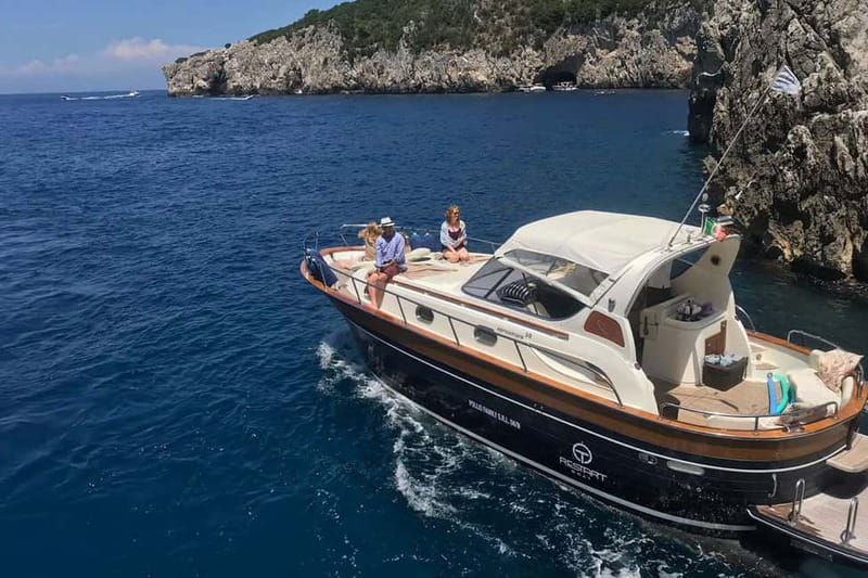Positano: Amalfi Coast & Emerald Grotto Private Boat Tour - Leaving Positano and passing Montepertuso