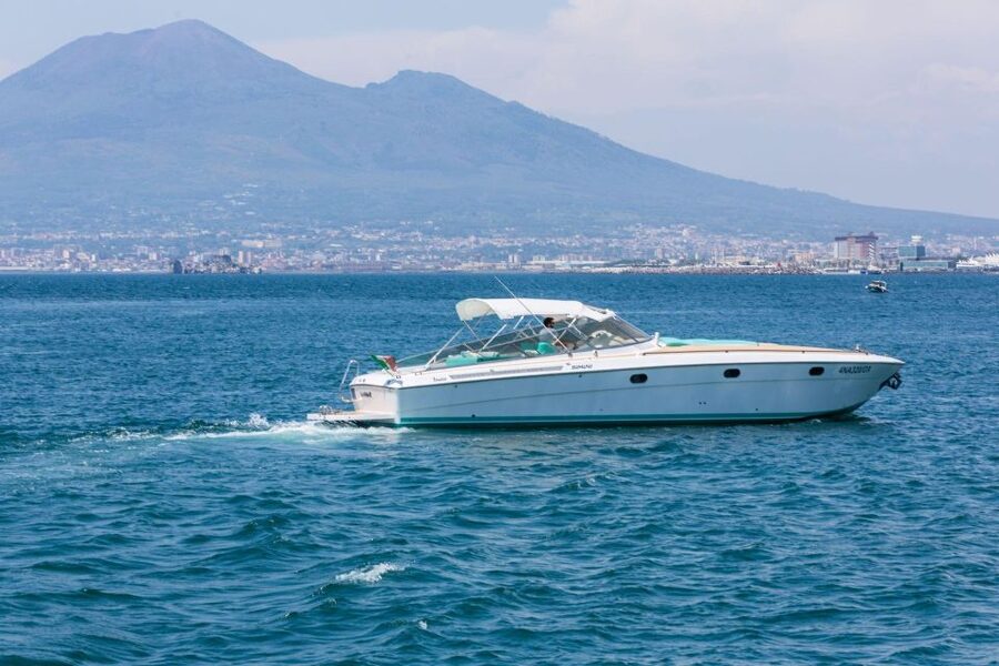 Positano: Boat Tour of Capri with Drinks and Snacks - Capri’s grottos and Faraglioni rocks