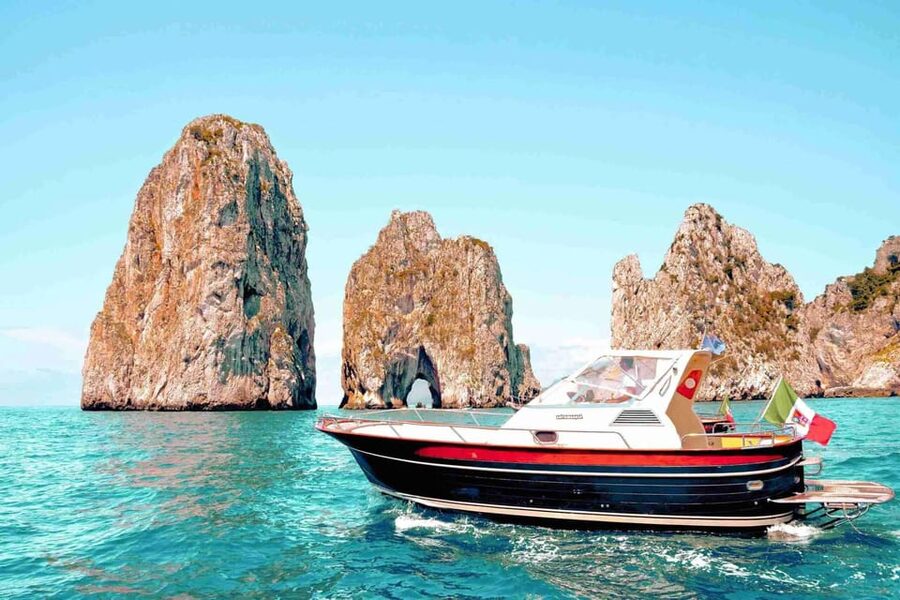 Positano: Capri and Blue Grotto Shared Boat Tour with Drinks - Circling Capri’s cliffs, caves, and Faraglioni