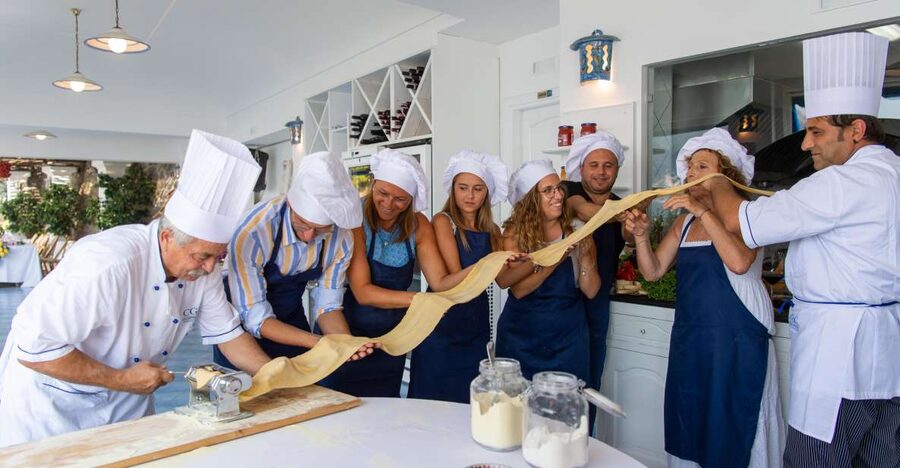 Praiano: Cooking Class with Dinner Overlooking the Sea - Welcome drinks, aprons, and the first taste