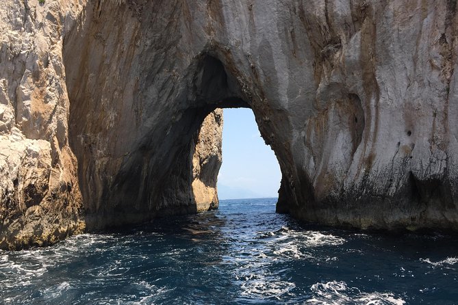 Private Boat Excursion from Sorrento to Capri and Positano - Capri’s grottos, lighthouse, and Faraglioni