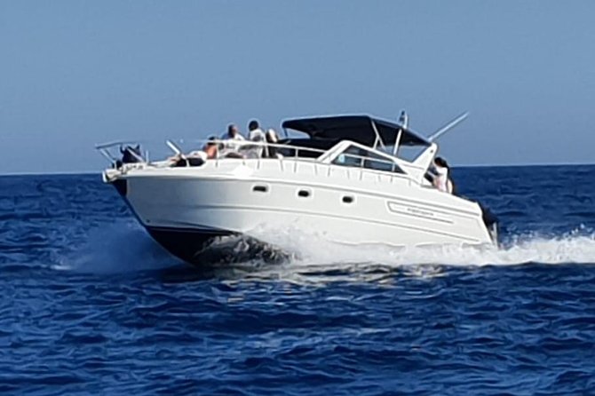 Private boat tour to Capri departing from Sorrento - Punta Carena and the green reflections