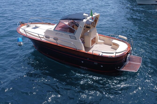 Private Boat Tour to discover Capri - Green Grotto and Punta Carena Lighthouse