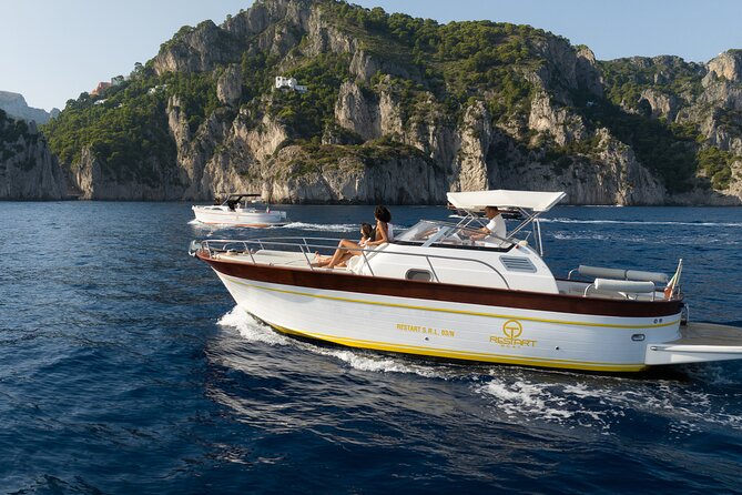 Private Ischia Boat Tour from Positano: Full Day Trip - Arriving beneath the Aragonese Castle
