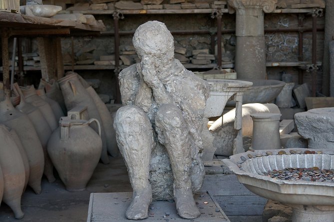 Private Skip-the-line Pompeii & Mt. Vesuvius Tour from Sorrento - Shops, baths, and a Roman street on Via dell’Abbondanza
