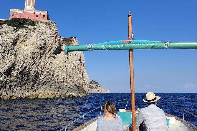Private tour in a typical Capri boat - Capri’s coast from a classic gozzo